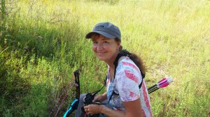 Lana looking happy, she's always smiling and enjoying her archery. This photo of her came out super good.